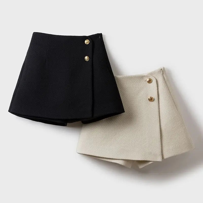 Black and beige skirts with button details on a white background
