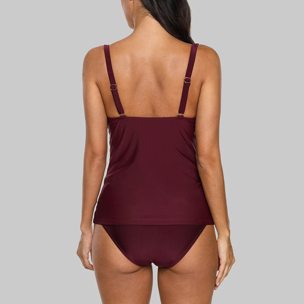 Maroon swimsuit on a gray background