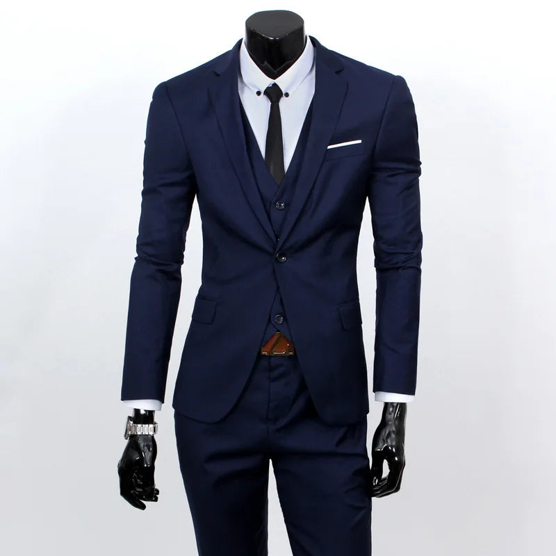 Navy blue suit with white shirt and black tie on a mannequin against a white background