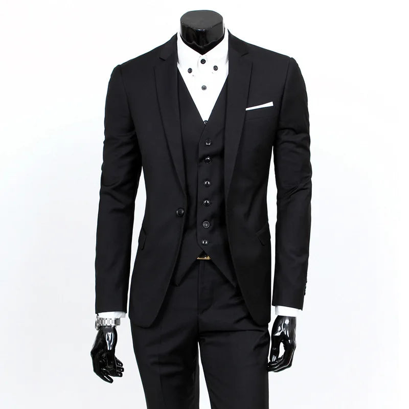 Black suit with vest and white shirt on a mannequin against a white background