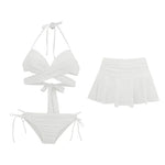 Load image into Gallery viewer, White bikini set with matching skirt on a white background
