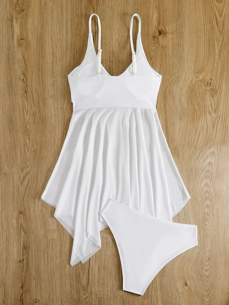 White swimsuit on a wooden surface