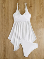 Load image into Gallery viewer, White swimsuit on a wooden surface
