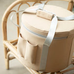 Load image into Gallery viewer, Beige cooler bag with a strap on a wicker chair
