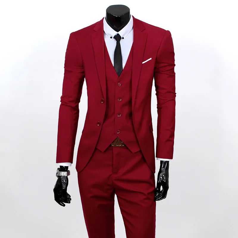 Red suit with black tie on a mannequin against a white background
