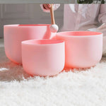 Load image into Gallery viewer, Set of pink ceramic bowls on a white surface
