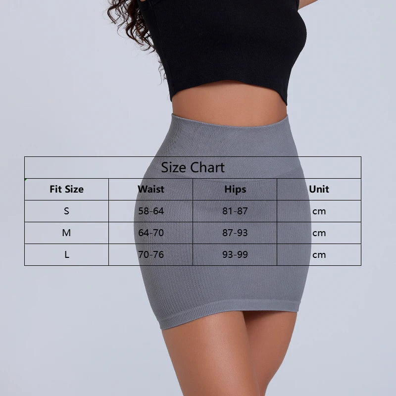Gray skirt worn by a person with a size chart overlay on a light gray background